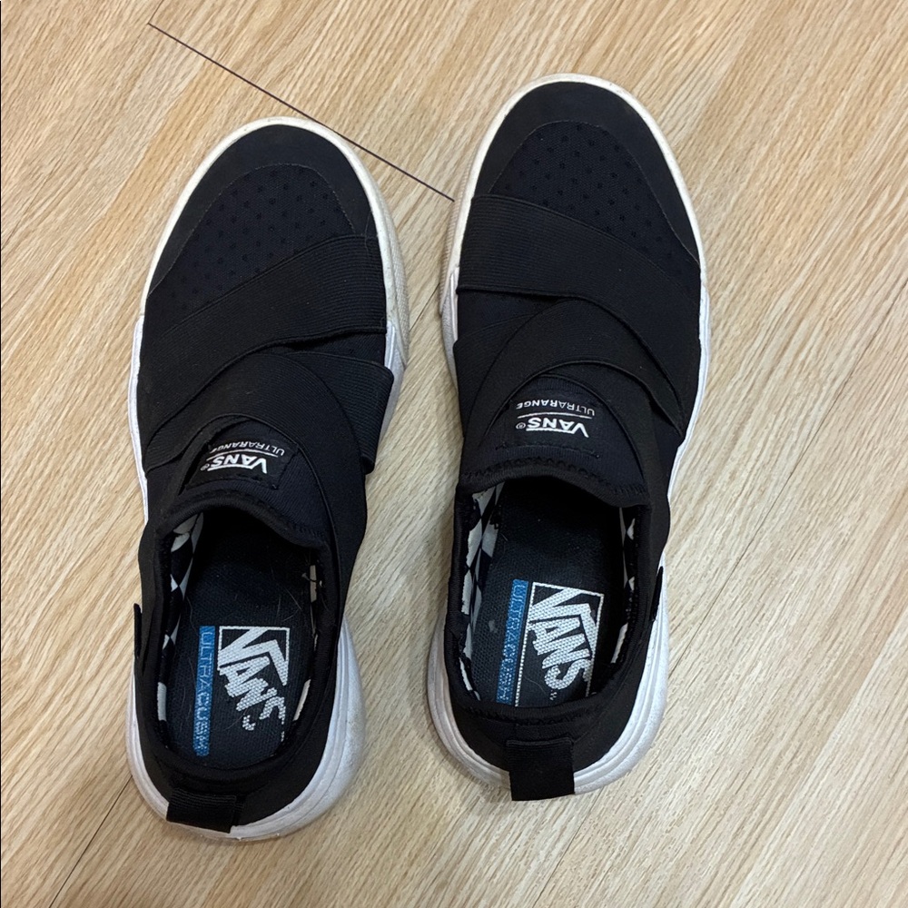 Vans Women’s Black Slip-On Elastic Strap Sneakers with White Sole